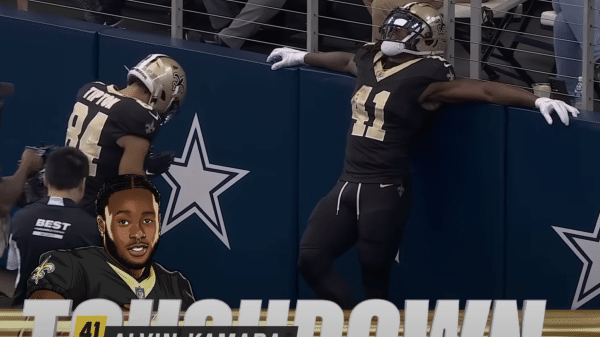 Kamara scoring a touchdown